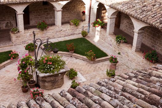 View of a cloister of an ancient Franciscan convent in assisi