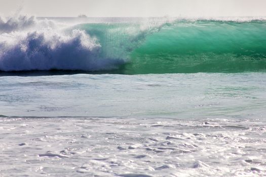 Big wave crashes on to the shore