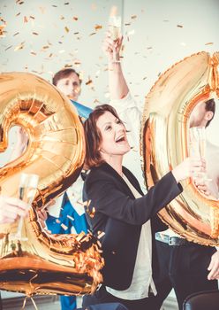 Business people celebrating 2018 New Year at office party