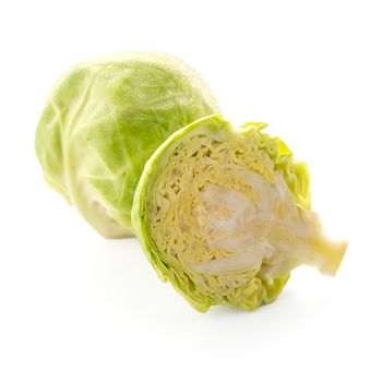 Fresh brussels sprouts isolated on white background.