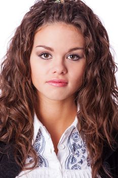 Closeup portrait of pensive young woman with curly hair isolated