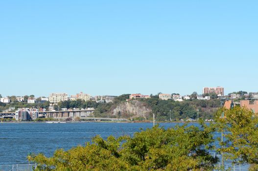 View from the High Line in New York City across the Hudson River to Weehawken, New Jersey. The approach ramp to the Lincoln Tunnel can be seen on opposite shore.