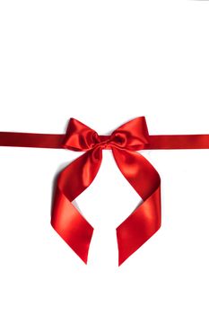 Red gift bow isolated on white background