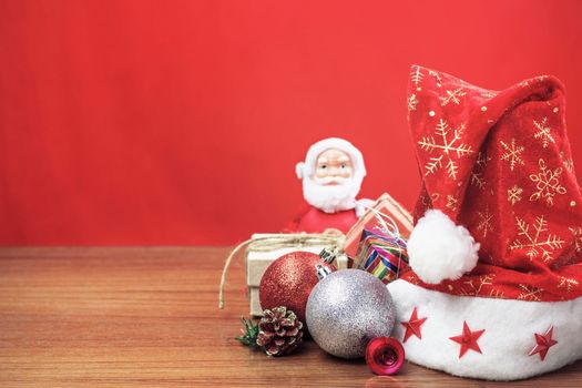 Christmas decorations and gift boxes on wooden.