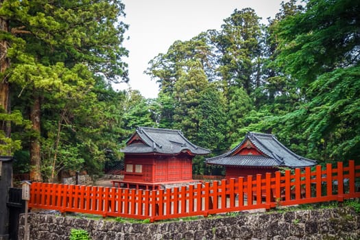 Traditional red wooden Shrine in Nikko, Japan