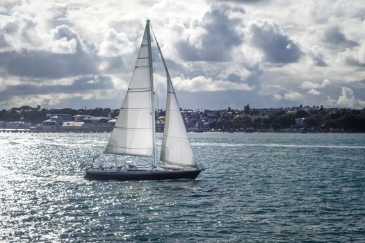 Sailing ship with dramatic sky in Auckland, New Zealand