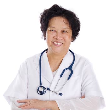 Old Asian female medical doctor smiling,  standing isolated on white background.
