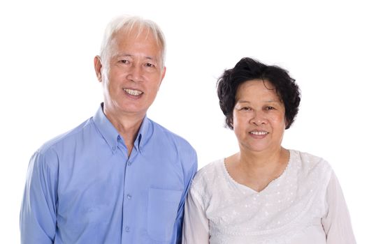 Happy Asian mature couple smiling,  standing isolated on white background.