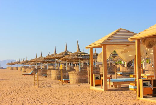 Tents fot recreation on the beach at sun light