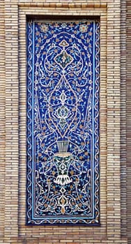 Old Eastern mosaic on the wall of a mosque, Uzbekistan