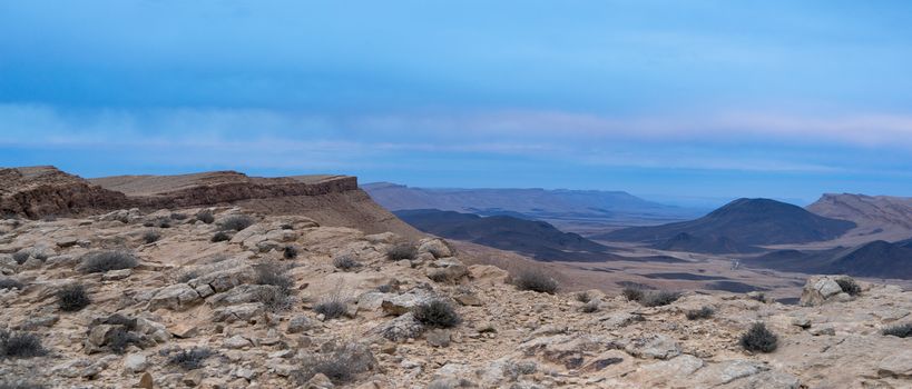 Travel and hiking in Israeli stone desert and crater