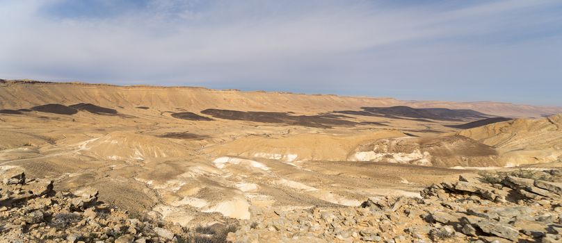 Travel and hiking in Israeli stone desert and crater