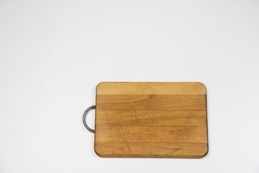 Old chopper and board, tools for butcher, white background.