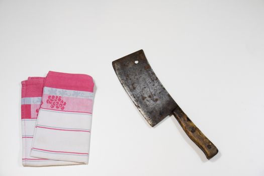 Old chopper and board, tools for butcher, white background.