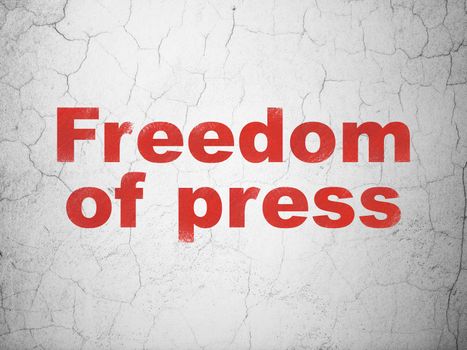 Political concept: Red Freedom Of Press on textured concrete wall background