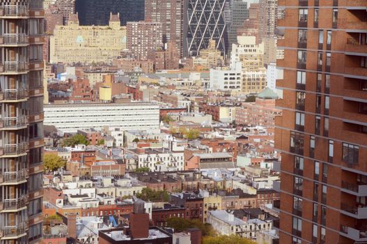 Cityscape of Hell's Kitchen in New York City, showing the skyscrapers and diverse architecture of Manhattan