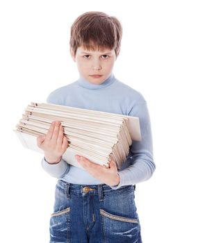 Serious upset schoolboy holding lots of papers isolated on white