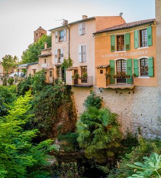 River and trees in the lovely village of Moustiers Sainte Marie in France