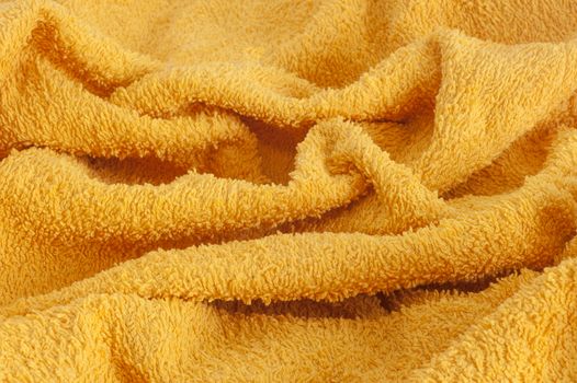 a background in a towel yellow towel
