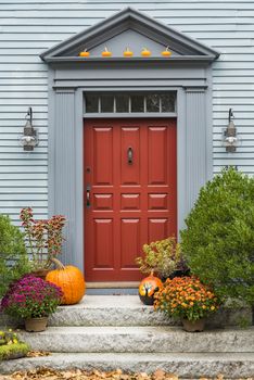 Door of a typical New England residential house with small entrance garden