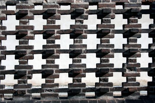 Fence of the red brick on church on Vysehrad in Prague