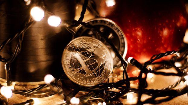 Digital currency physical metal bitcoin coin. Christmas cryptocurrency concept.