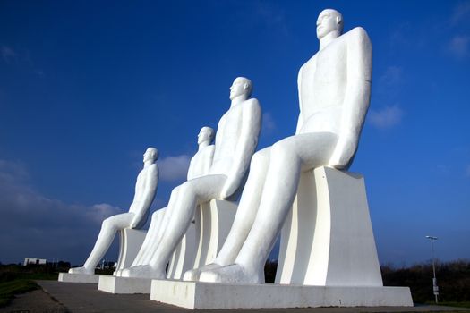 ESBJERG - NOVEMBER 9 2017: The Men at Sea is a monument of four 9 meter tall white males, located in Esbjerg, Denmark on the Beach. The sculpture was designed by Svend Wiig Hansen.
