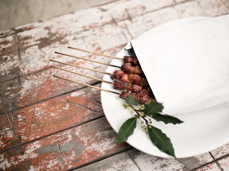 Arrosticini meat for Take away inside an envelope