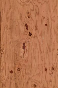 Plywood surface with knots