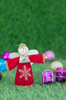 Celebration of New year and Christmas,Close up Christmas decoration on green grass background with copy space