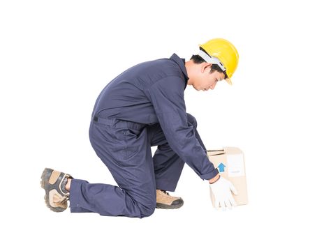 Man in uniform lifting the paper box, Isolated on white background