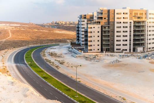 construction work in the desert, new building and a road