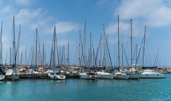 seascape, moored sailing ships at the pier