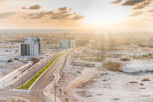 construction work in the desert, landscape at sunset
