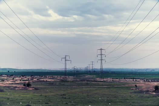 industrial landscape, high voltage poles with wires