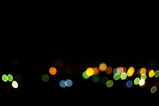 yellow lights on a black background abstraction night city