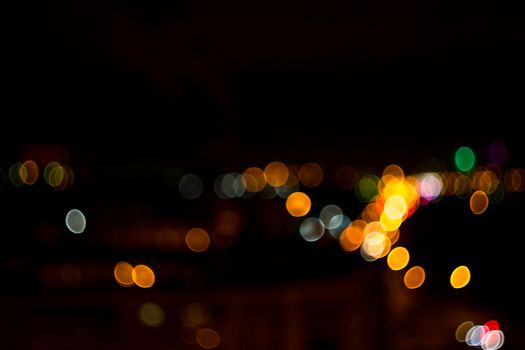 yellow lights on a black background abstraction night city