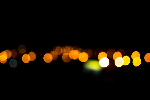 yellow lights on a black background abstraction night city