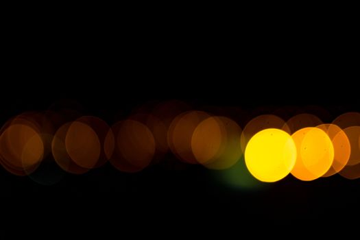 yellow lights on a black background abstraction night city