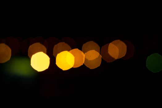 yellow lights on a black background abstraction night city