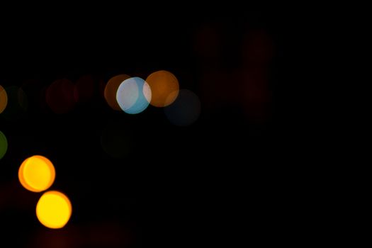 yellow lights on a black background abstraction night city