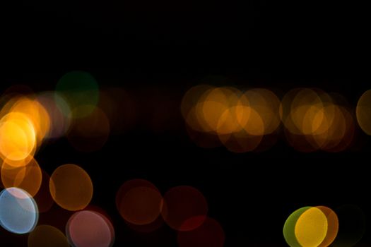 yellow lights on a black background abstraction night city