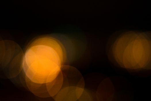 yellow lights on a black background abstraction night city