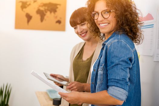 Shot of two businesswoman working together in an office