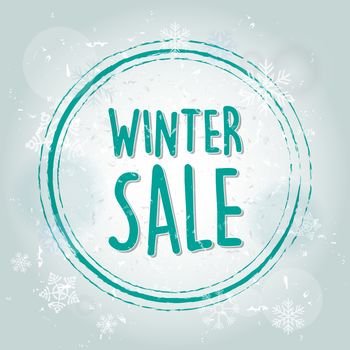 winter sale with snowflakes over blue drawn background, business seasonal shopping concept banner