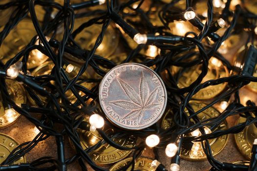 Brass marijuana sativa christmas coin. Legalize it.