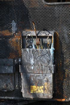 Detail of a burnt out combine harvester