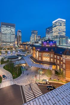 Landscape of Tokyo Station at dusk with building skyline