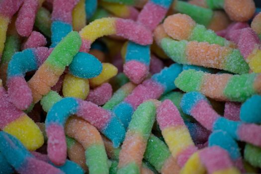 Group of colored candies background in a pastry shop