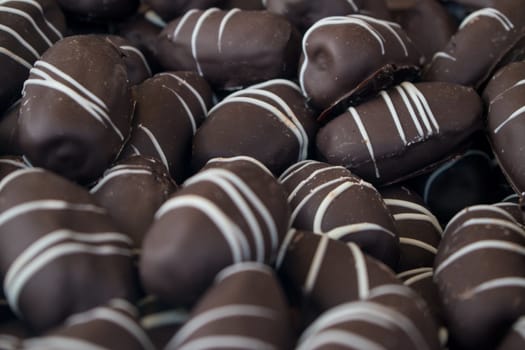 A group of dark and white chocolate pralines